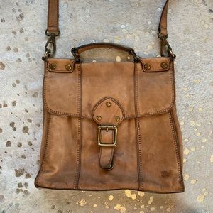 worn fossil leather satchel